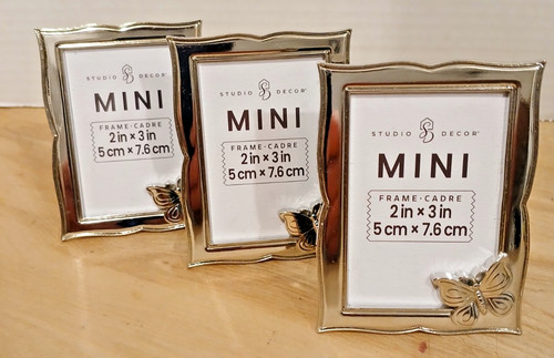 Mini silver tone butterfly - mini,